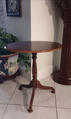 Bombay Company Medium Cherry  Oval Coffee Table,measures 21" H x 14" W x 19" L.