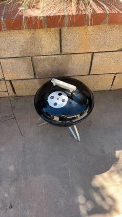 Small Weber Smokey Joe bbq with charcoal chimney