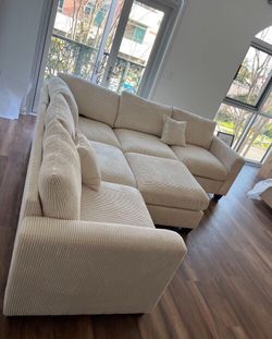 Stunning sectional sofa with ottoman ivory corduroy