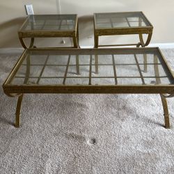 Three glass and metal tables