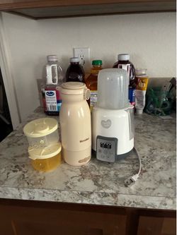 2 Infant Bottle Warmer + 2 formula distribution cups