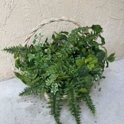 basket with artificial plants