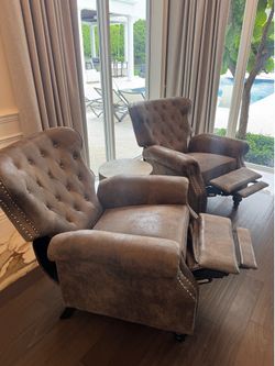 Gorgeous Pair of A classic push-back reclining armchairs w/ diamond-button tufting, rolled arms, a high winged back, and silver/copper nailhead trim.