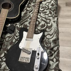 Electric Guitar Brand Caraya ,color Black And White 