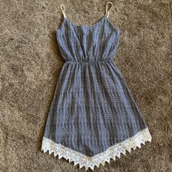 Black and white patterned babydoll dress with lace trim; perfect condition