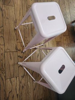 Two pink metal counter stools new