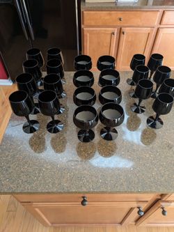 Black Crystal Wine Glasses.  $5 per glass unless you buy all of them I will apply a 25% discount.