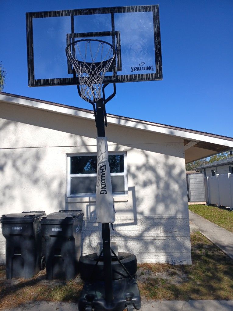 Spalding 60 inch Acrylic Screw Jack Portable Basketball Hoop System