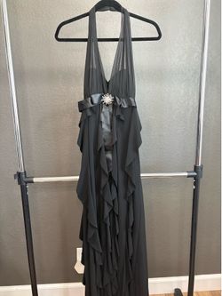 Betsy & Adam BA2301 Formal Evening Gown / Prom. Black Halter Neck Ruffle Gown with Rhinestone Brooch