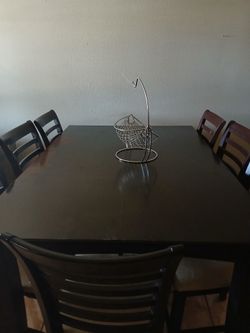 High top brown table w/ chairs