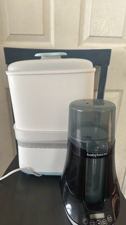 New baby bottle sterilizer &dryer  & lightly used baby brezza bottle and breast milk warmer