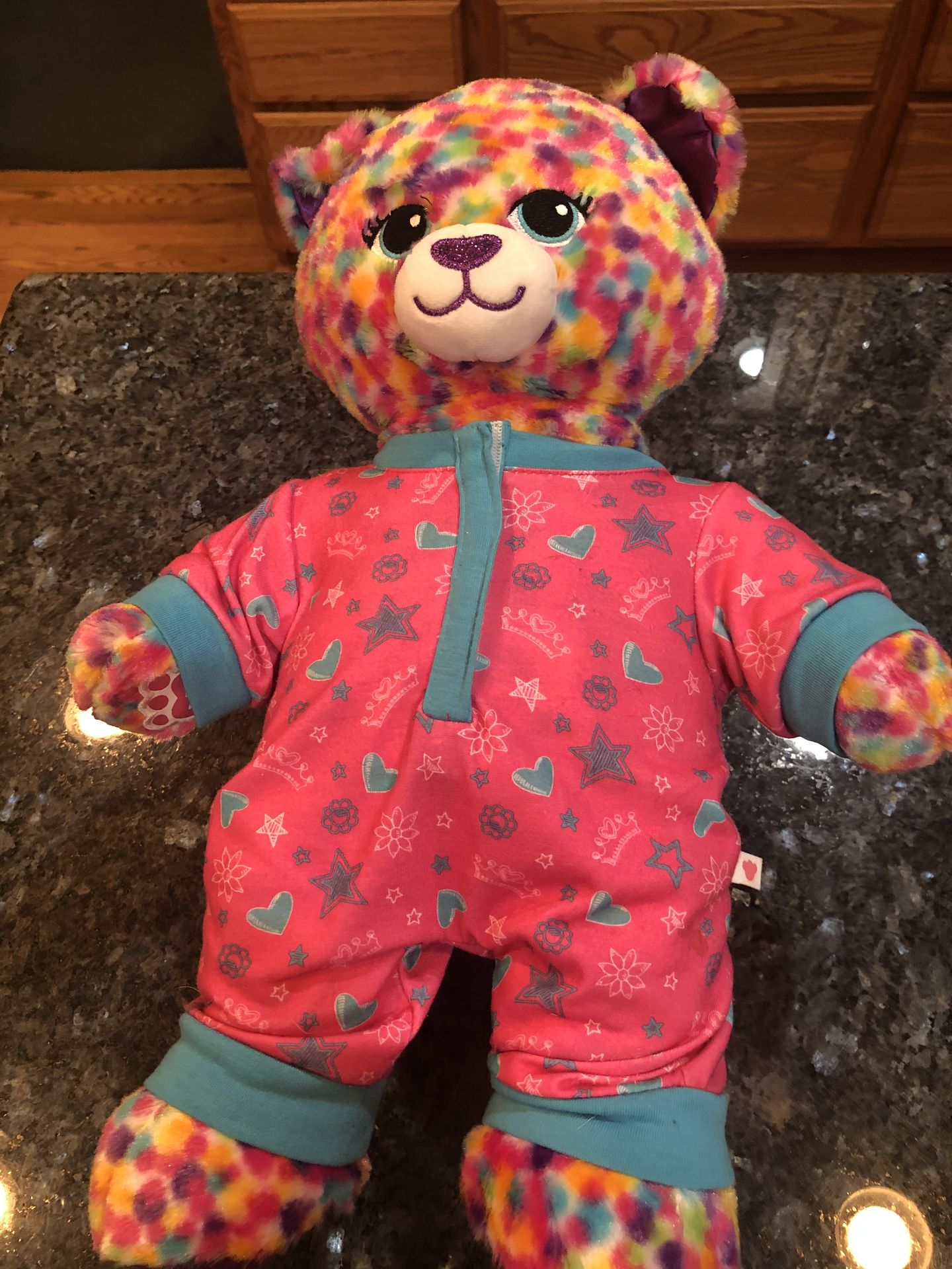 Build A Bear Workshop Teddy Bear Wearing a Pair if cute one piece pajamas . . Very cute. Size 15 inches tall. Preowned excellent condition. Only