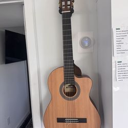 New nylon  acoustic guitar with TUNER and pick up