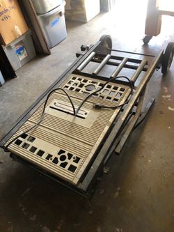 Portable Mikita table saw with feeder and roller table and additional accessories