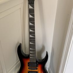 Electric Guitar, 6 strings, Sunset color, soft bag, strap, whammy bar, tool