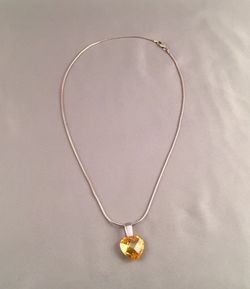 Sterling silver yellow zirconia heart necklace