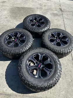 GMC wheels 18s 6 lugs used tires 275/70r18 Nitto 80% life