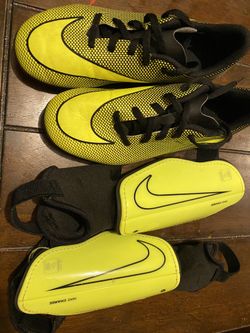 Kids soccer shoes and shin guards size 4Y like new!!!