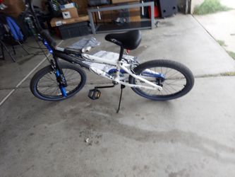 BMX 20 inch bike with pegs and brakes