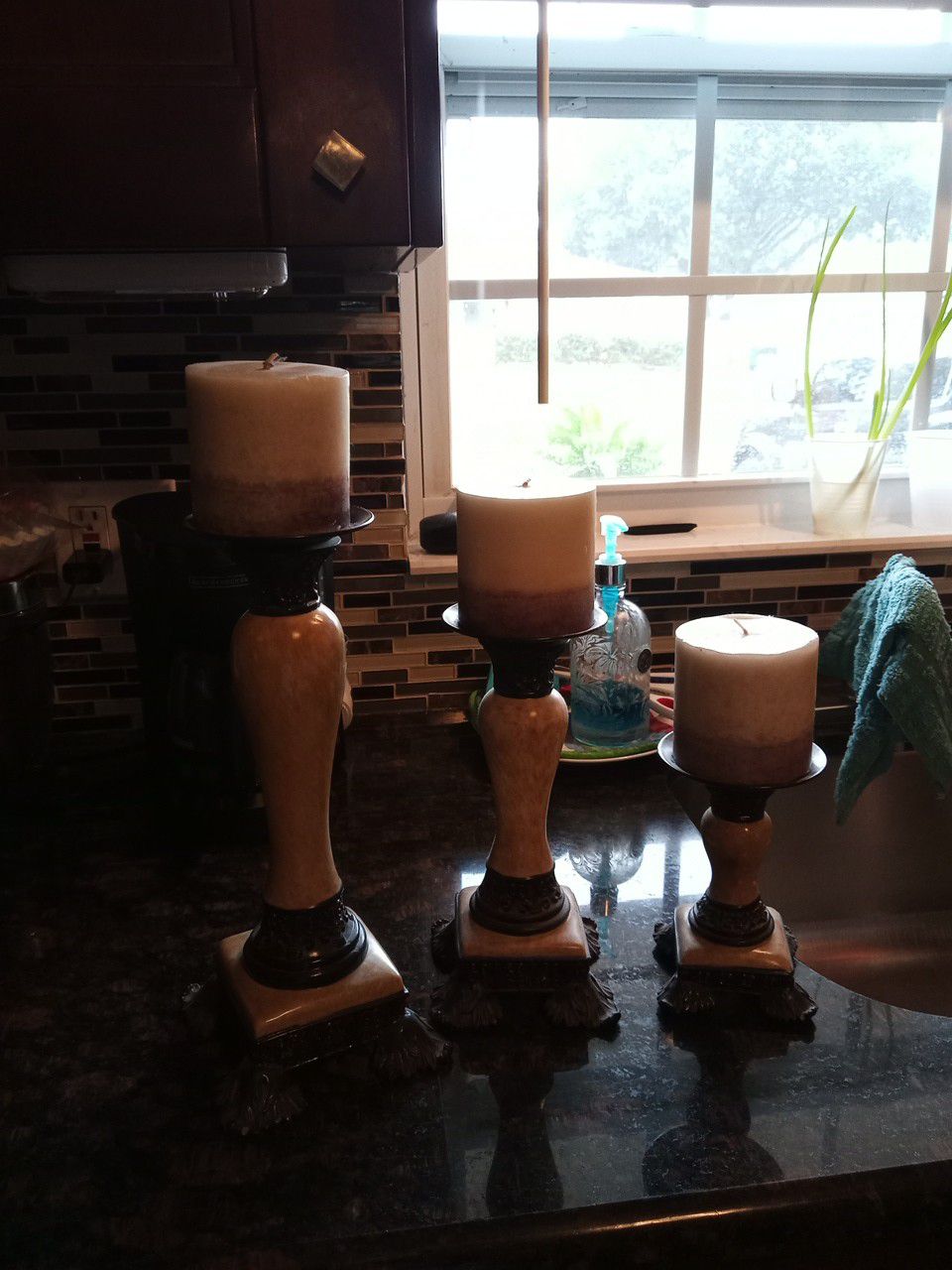 3pcs candle holders and candles $10