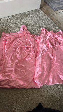 Bridesmaids dresses  pink when is a size large one is a size small