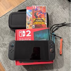 Nintendo switch 2 with games and case