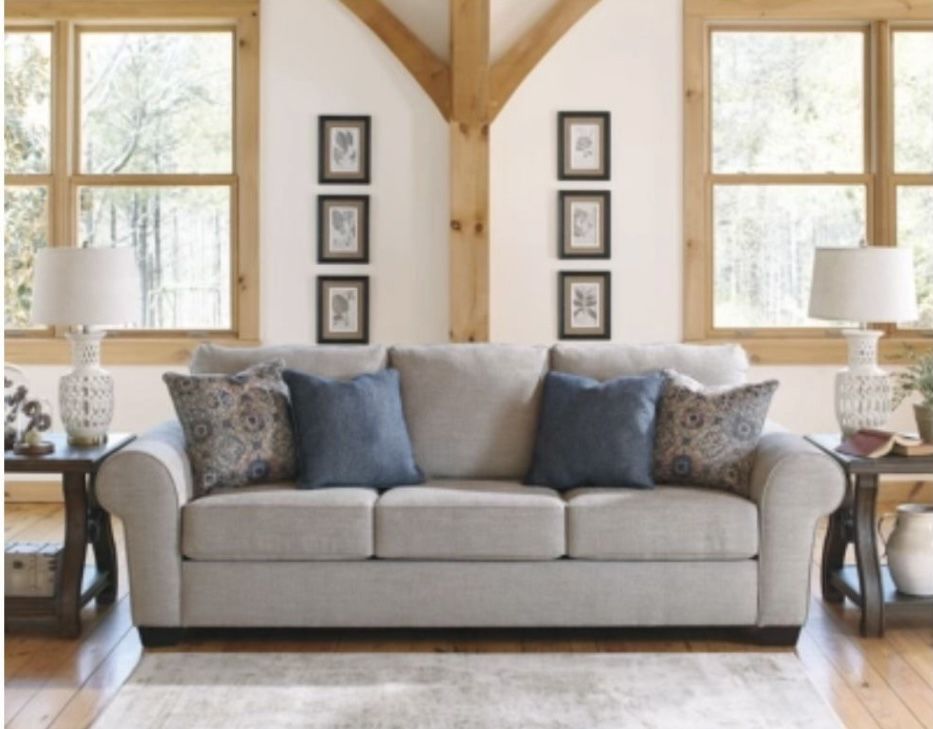 Free Delivery! Lightly used Gray Sofa from Ashley furniture. 102(L) 41(D) 40(H) Fully Clean, From Per Free Home.