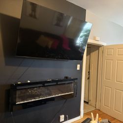 65” Tv And Fire Place