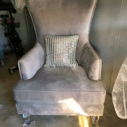 Beautiful Modern wingback chair with acrylic feet