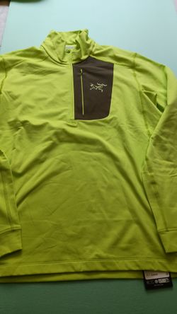 The Arcteryx Rho LT Men Zip Neck New with tag