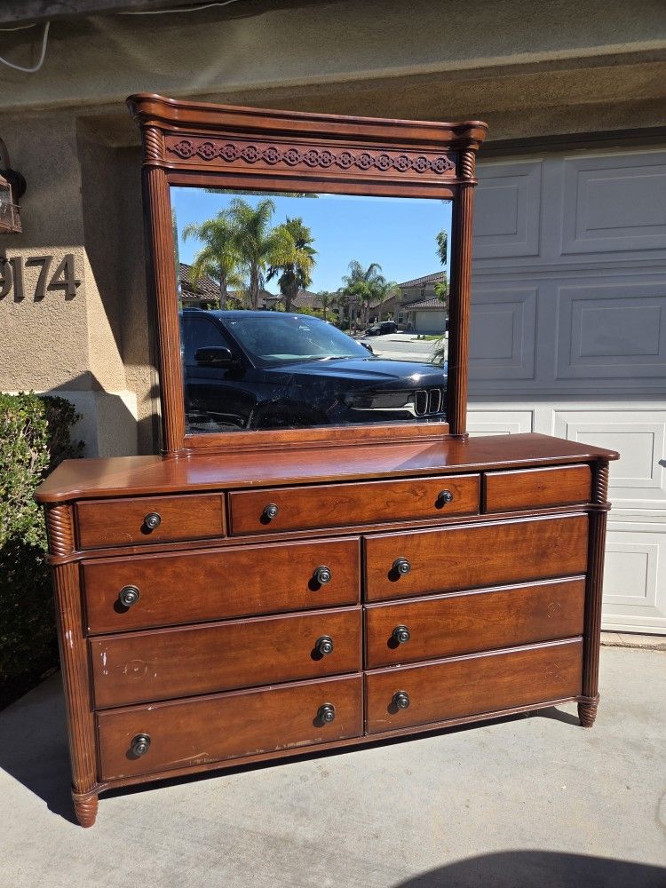 Large wood dresser with mirror (mirror can detach).

