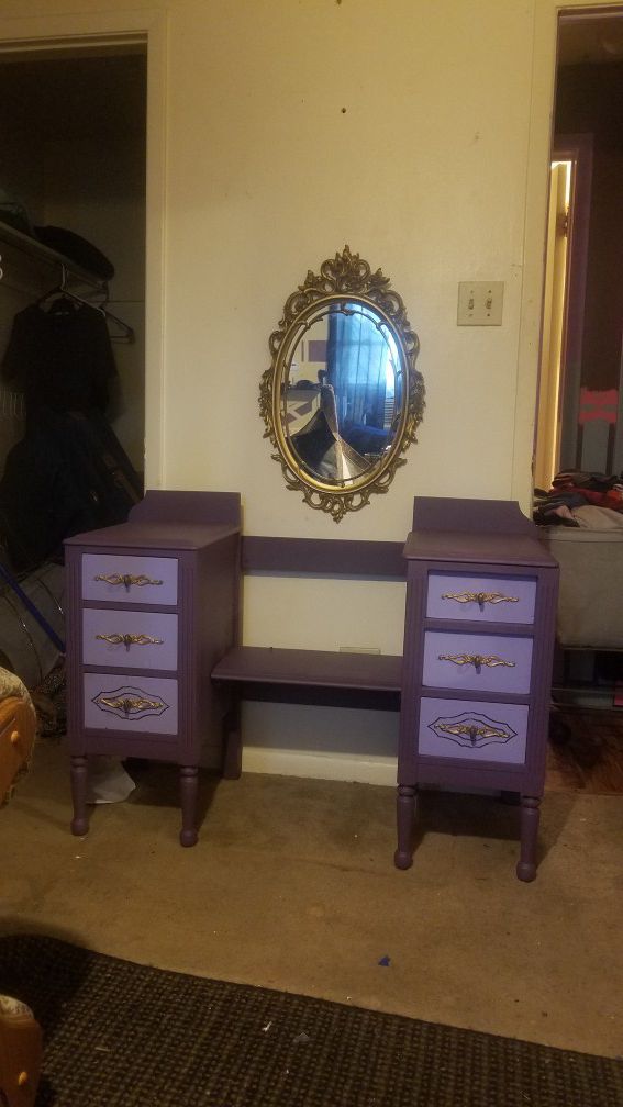 Purple and gold antique vanity with mirror
