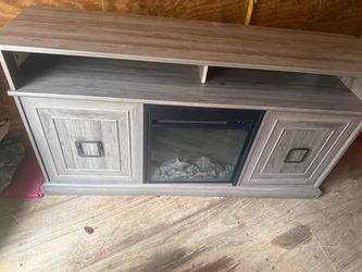 Mueble de televisión con chininea eléctrica