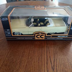PRICE REDUCED Collector Edition Model Car  1963 Cadillac Series 62 Convertible Yellow In Box 1:18.
