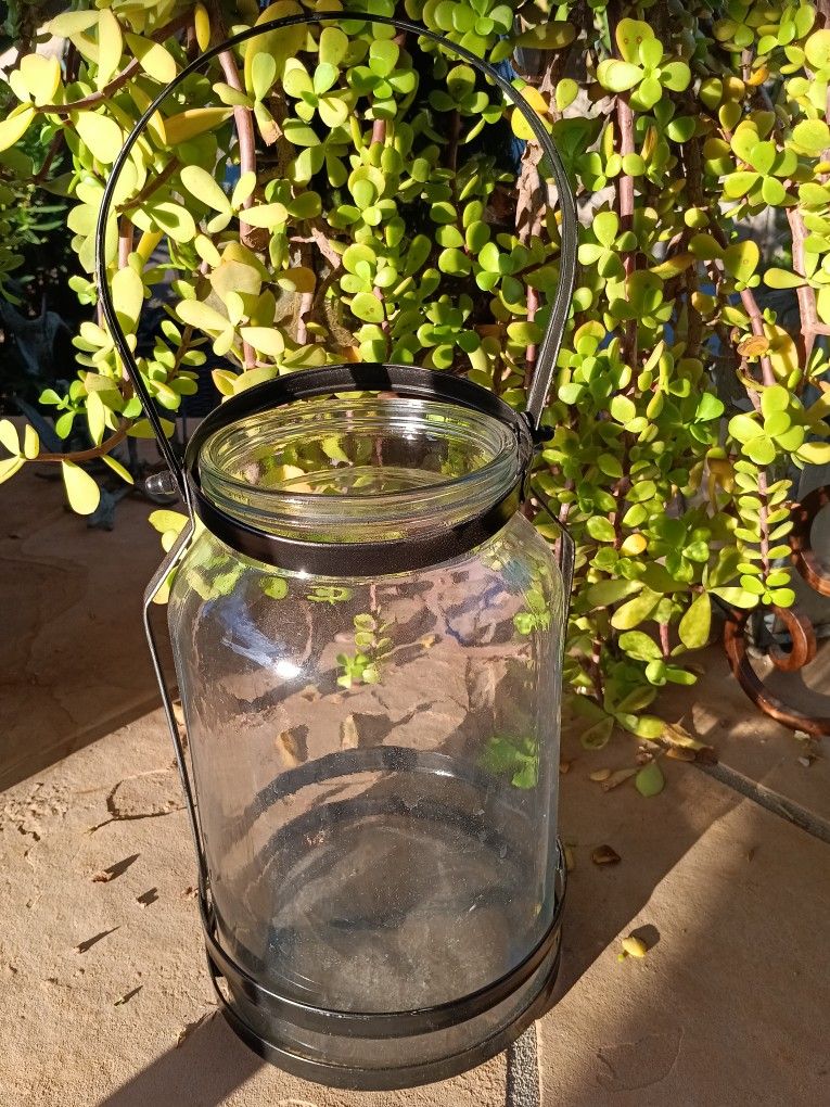 $9 Garden Candle Holder/ Plant. Glass with Black Metal Hanger
10"x 7"