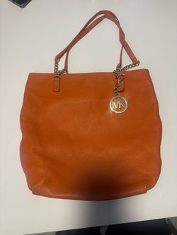 Michael Kors orange purse