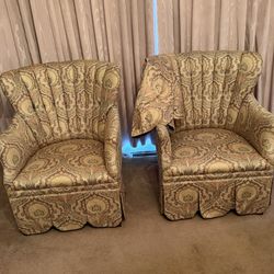 Pair of side arm chairs with round table cloth