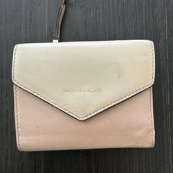 Pink and white small MK wallet in fair condition 