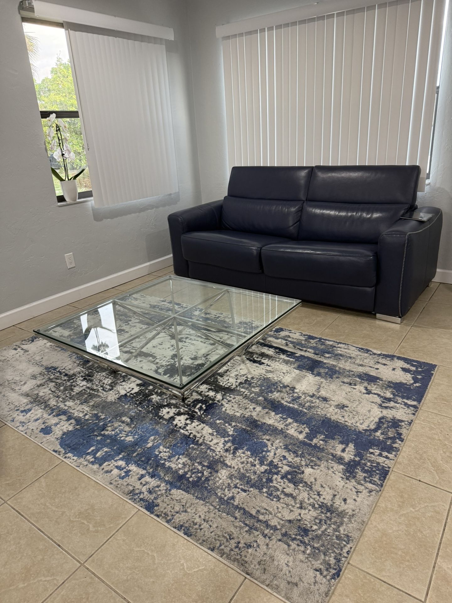 Sofa Bed, Rug And Table