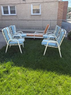 SET OF 4 PATIO CHAIRS AND 1 LOUNGE CHAIR. VERY COMFORTABLE AND GOOD CONDITION. METAL FRAME. LIGHT WEIGHT AND STACKABLE FOR EASY STORAGE. $125.00   OR