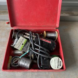 soldering Iron And Rolls Of Solder