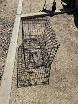 Cage for animal 18-30 lbs  size not sure but fits two poodle dogs