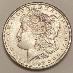1899 - O  MORGAN SILVER DOLLAR IN UNCIRCULATED CONDITION