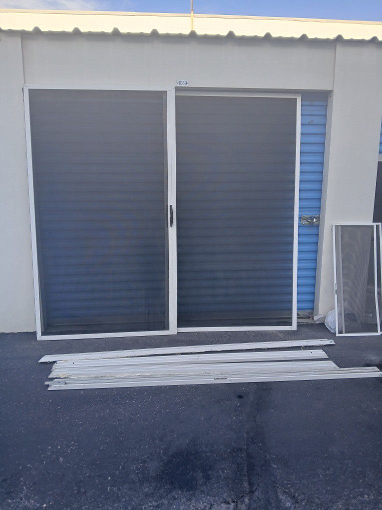 48x84 Steel Security Doors With complete Tracks And Locks On Handles