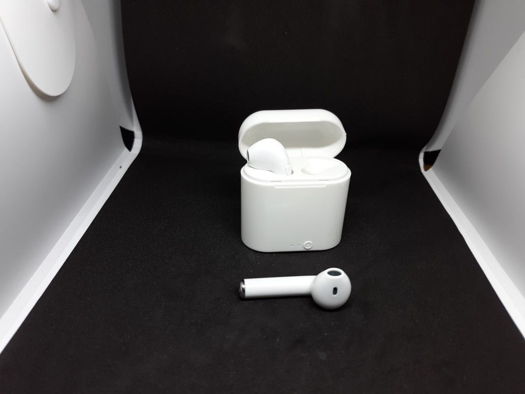 NEW white wireless earpods they are NOT apple but they work with ANY phone or bluetooth device!!!