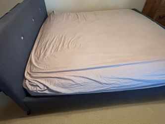 Upholstered wood king bed frame