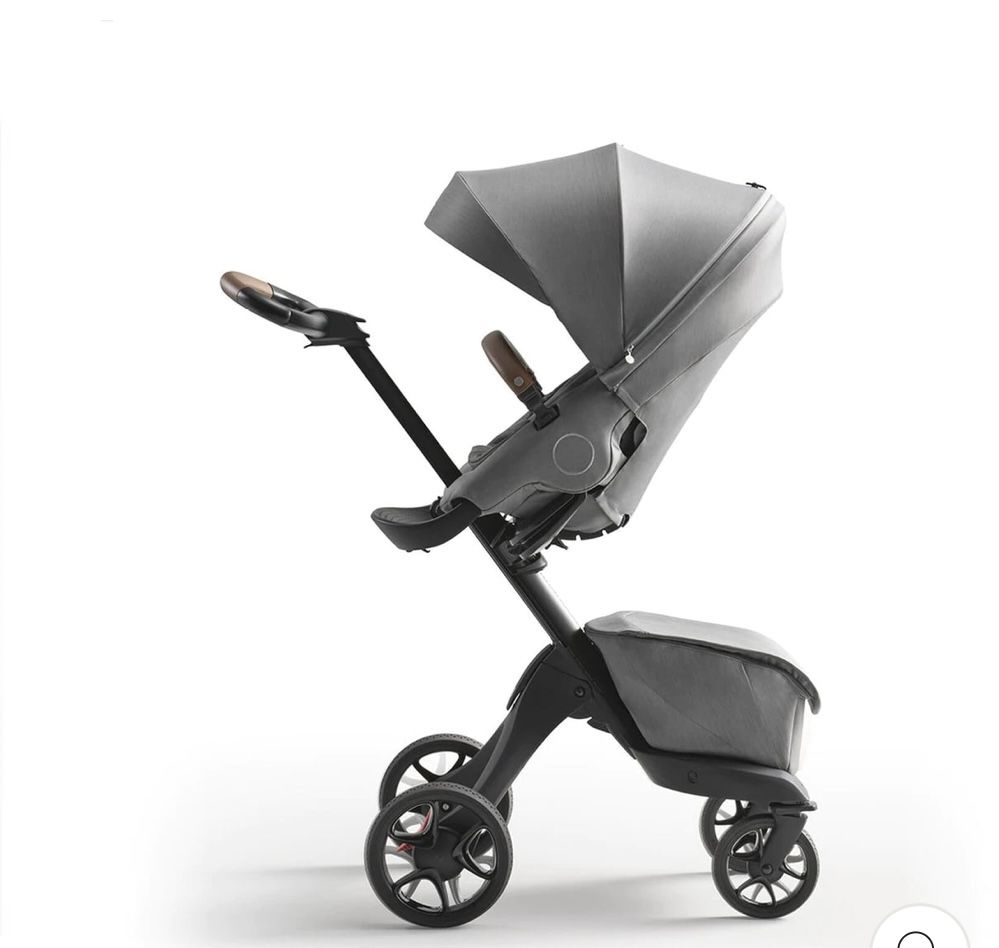 Stokke xplory toddler ride along and rain/wind cover.