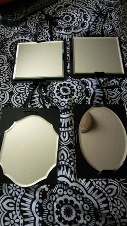 4 small mirrors