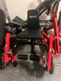 Dual plate loaded leg extension/ leg curl