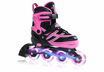 In great condition adjustable pink in-line skates for ages 5-12